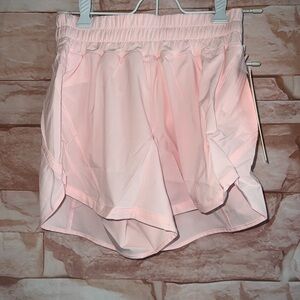 LULULEMON Track that MR Short 5" Size 4 Zip Pocket Baby Pink Mid Rise NWT $68